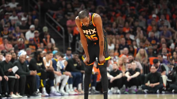 Phoenix Suns forward Kevin Durant looks on during a game.